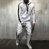 Tracksuit Men 2 pezzi Set 2021 Brand autunno inverno felpa con cappuccio + Pantaloni con coulisse Pantaloni Maschile Stripe Stripe Felpe con cappuccio Y0310