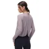 Dessus de yoga T-shirt à manches longues fendu beau dos demi-chemise de sport mode vêtements de sport femmes Blouses