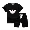 Baby sommardräkter pojkar preppy stil twopiece set barn casual utomhuskläder barn fast färg t -short shorts kläder set9582053