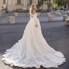 2021 Abiti da sposa a sirena di lusso sexy Abiti da sposa con spalle scoperte Sheer Illusion Treno staccabile Overskirts Tulle Tiered Appliqued Pizzo Maniche lunghe Personalizzato