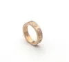 Europa Amerika Stijl Mannen Dame Vrouwen Titanium staal 18K Goud Gegraveerde Letter Instelling Zes Diamanten Liefhebbers Smalle Ring Maat69 Twinkle7467628