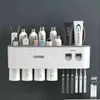 AHAWILL Porta spazzolino a punzonatura gratuito a parete Distributore automatico di spremiagrumi per dentifricio Rack di stoccaggio Accessori per il bagno 211130