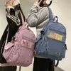 Mochila unisex estudantes grande capacidade coreano cor pura meninos meninas campus estilo schoolbag nylon À prova d 'água saco de viagem moda 202211