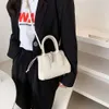 Små vita läder axelväskor för kvinnor ren färg Digner Crossbody Ladys Drawstring Tote Msenger Bag Wild Handväskor