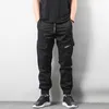 Homens Moda Streetwear Mens Jeans Jogger Calças Juventude Casual Verão Azido Calças Bandas Marca Botão Corte de Calças de Jeans Europeu 210723