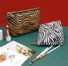 DHL100st Makeup Väskor Kvinnor PU Zebra Prints Stora kapacitetslagringspåsar