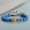 Mannen mode blauwe natuursteen kraal armband gouden kleur kroon vorm koperen ingelegd verstelbare armband met zirkoon decoratie