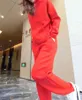 Tuta sportiva moda donna primavera lavorata a maglia abbigliamento casual da donna sciolto pantaloni harem con cappuccio in due pezzi vendita 210520
