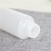 10ml 20ml 30ml 50ml Botella de plástico exprimible Recipiente de muestra cosmética recargable Botellas de loción con tapa abatible PE