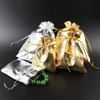 Confezione regalo 50 pezzi/lotto tre dimensioni sacchetto di gioielli in organza con coulisse in oro argento di alta qualità borsa da matrimonio natalizia