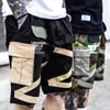 Uomo Streetwear Camouflage Cargo Shorts Pantaloni Uomo Pantaloncini larghi Mens Hip Hop Pantaloncini multitasche studente Pantaloni corti militari 210322
