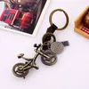 Rowerowe pierścienie Retro Splot Skórzany Sport Bike Charm Keychain Posiadacz Torba Wisi Dla Kobiet Mężczyzn Moda Biżuteria Will I Sandy