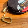 Plånbok Kvinnor Mänsmynt Purse Mode Plånböcker Key Pouch Top Quality Classic Cartoon Card Holder Zipper Bag Mini Väskor med kedja