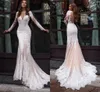 Manches longues en dentelle sirène robes de mariée 2022 Illusion champagne plage robe de mariée avec bouton dos transparent O-cou balayage train