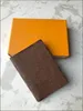 Designs de luxe Porte-cartes Portable KEY P0UCH portefeuille classique Mans femme porte-passeport Porte-monnaie Avec sac à poussière et boîte Fleurs marron