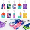 26-Buchstaben-Schlüsselanhänger, Zappelspielzeug, Silikon, einfache Grübchen, Taschenornamente, Anti-Stress-Kindergeburtstagsgeschenke