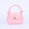 Flickor Prinsessan Handväska Kvinna Senior Sense Cross Body Tide Lady Candy Color Chain One Shoulder Bag Magnetic Buckle Jelly Väskor F852