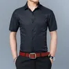 Solida skjortor män sommar casual kortärmad smal formell skjorta mens arbete affärer märke camisas plus storlek non Iron chemise homme 210524