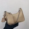 Försäljning 2st/Set Luxury Shoulder Bags Lady Crossbody Plånbok äkta läderväska nylon mobiltelefonficka handväskor flickor totalt två objekt hobos plånböcker