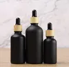 Essential Oil Bottle Matte Black Glass e liquid Essential-Oil Perfume Bottles with Reagent Dropper and Wood Grain Cap DHL SN3282