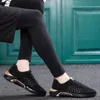 Najwyższej jakości 2021 Przyjazd męskie Damskie Buty do biegania Moda Czarne Białe Oddychające Runners Outdoor Sneakers Rozmiar 39-44 Wy10-1703