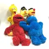 الرسوم المتحركة Uniqlo Co التي تحمل علامة Sesame Street Emo Elmo Plush Doll4184014