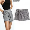 Jupe femme noir blanc Plaid taille haute jupe courte femme mode vichy avant noeud décontracté été Shorts 210519