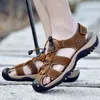 Nxy Sandals Mixidelai جلد طبيعي أحذية رجالية صيف جديد كبير الحجم النعال الأزياء الكبيرة 38-47 0210