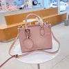 M57639 Designer di fascia alta Borsa shopping da donna sfumata Fiore di tela gigante accessoriata pelle bovina colorata Borsa a mano Borsa a tracolla a tracolla