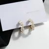 Bloem oorbel mode gouden plating witte hars hoepel bengelen oorbellen vrouwen sieraden meisje student geschenken voor feest