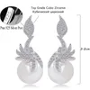 Prachtige Micro Pave Cubic Zirconia Stenen Zilveren Kleur Vrouwen Dogelende Drop Pearl Oorbellen Mode-sieraden CZ061 210714