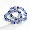 À la mode Simple mauvais œil breloques religieuses perles bleues brins chanceux Bracelet Match turc Bracelet pour femmes boucles d'oreilles