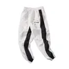 Męskie Legginsy Spodnie Deskorolka Deskorolka Spodnie dresowe Mężczyźni Fall Moda Sznurek Sport Streetwear Hip Hop Harem Pant Spodnie Y0927