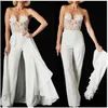 Stylish Lace White Jumpsuit Wedding Dresses Boho Beach Bride Dress Sexy Illusion Bodice Sleeveless Garden Bridal Gowns With Detachable Overskirt Pant Suits