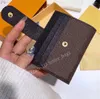 2021 Top Sale Luxury Designer Short Coin Purse Handväska Äkta Läder Brev Kohud Knapp Hasp Korthållare Kvinnor Mode Koppling Väskor Plånböcker