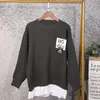 Suéter das mulheres 2021 tendência de moda t-shirt solta falsificação de duas peças com suéter outono e inverno manga comprida pulôver quente para as mulheres