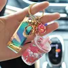 Keychains Bubble Keychain kreativer Milch Tee Tasse Flüssigkeit Kristall Quicksand Pendel Schlüsselringbeutel Anhänger für Frauen Schlüsselkette 4314717