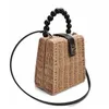 HBP Non-Brand Lovely wooden bead hand summer beach forest series metal lock one shoulder straw woven bag sport.0018