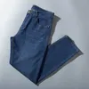 Mäns stretch jeans plus gödselmedel plus storlek lösa bredben byxor fett avslappnad mode raka slitage byxor 210531