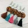 Porte-clés pompon en perles de bois, 5 couleurs, pendentif, décoration de bagages, porte-clés à la mode, cadeau de fête