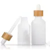 Houten dekselrubber Head druppelflesje wit porselein Cosmetics Stock Solution etherische olie Essence Split Flessen 10ml 15ml 20ml 30ml 50ml 100ml 3 16hb Q2