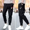 Pantaloni sportivi da uomo casual con rilegatura del piede moda versione coreana pantaloni da guardia neri da lavoro per l'estate e l'autunno Y0811