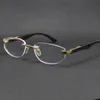 Verkopende eyewear accessoires originele zwarte buffalo hoorn zonnebril de kunstenaar zilveren 18 k goud metalen randloze glazen mannetje en vrouwelijke frame maat: 56-18-135mm