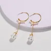 Dangle kroonluchter 2021 nieuwe gepersonaliseerde koelvormige metalen oorbellen natuurlijke speciaalvormige parel oorbellen handgewikkelde accessoires sieraden
