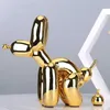 Creative Poop Balloon Dog estátua Decoração da casa moderna nórdica fofa resina animal escultura artesanato de desktop decors ornamentos 2105321596