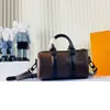 Newset Classic 21 cm Mini-Reisetasche Clutch Handtaschen Lady Designer Prägung Umhängetasche Messenger Umhängetaschen Männer Frauen Gepäck Tote Geldbörse