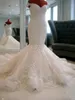 2022 Verspreide kanten zeemeermin trouwjurken van de schouder sweep trein Appliques Dubai Arabische stijl Bridal Jurken Custom Made 0509