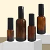 Partihandel Amber Glass Essential Oil Perfume Spray Flaskor med kvalitet Svart Fine Mist Atomizer Sprayer / Lotion Pump Top, 5ml-100ml