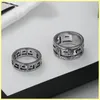 white silver couple rings
