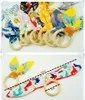 30 colores bebé juguete de dentición anillo de madera entrenamiento masticar chupetes juguetes Orejas de conejo raya estampado de puntos mordedores conejito de dibujos animados mordedor M3398